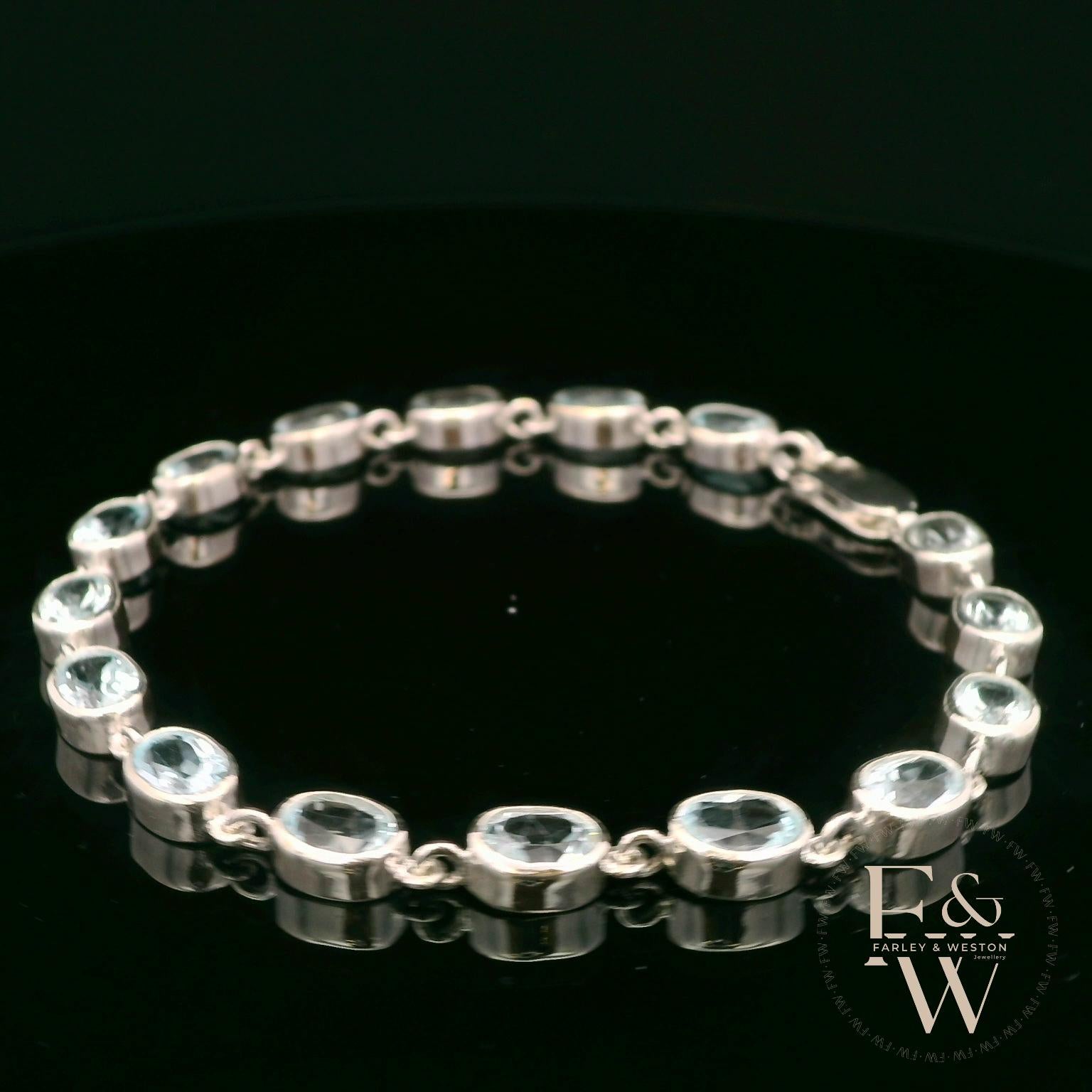 Sterling Silver Oval Blue Topaz Bracelet
