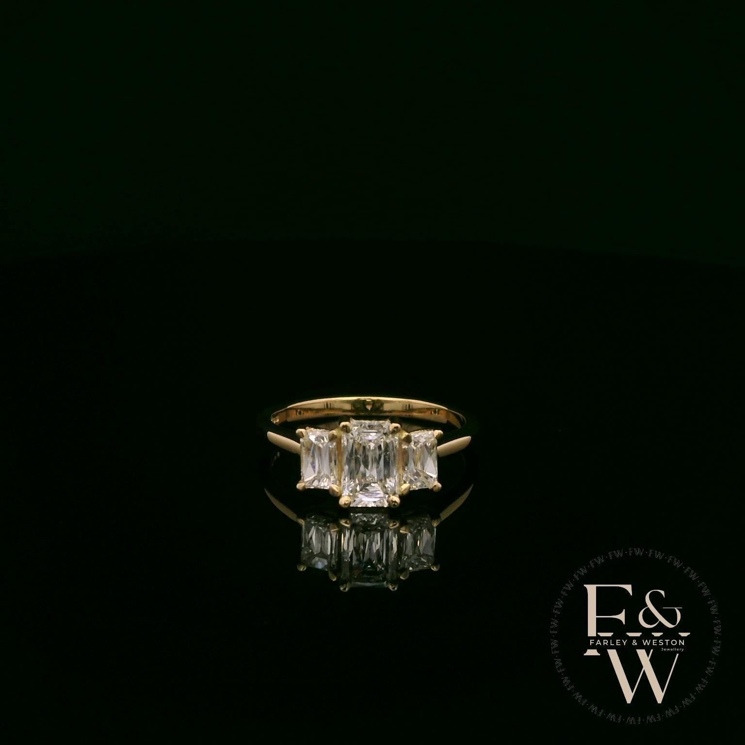 18ct Yellow Gold Three Stone Emerald-Cut Diamond Ring