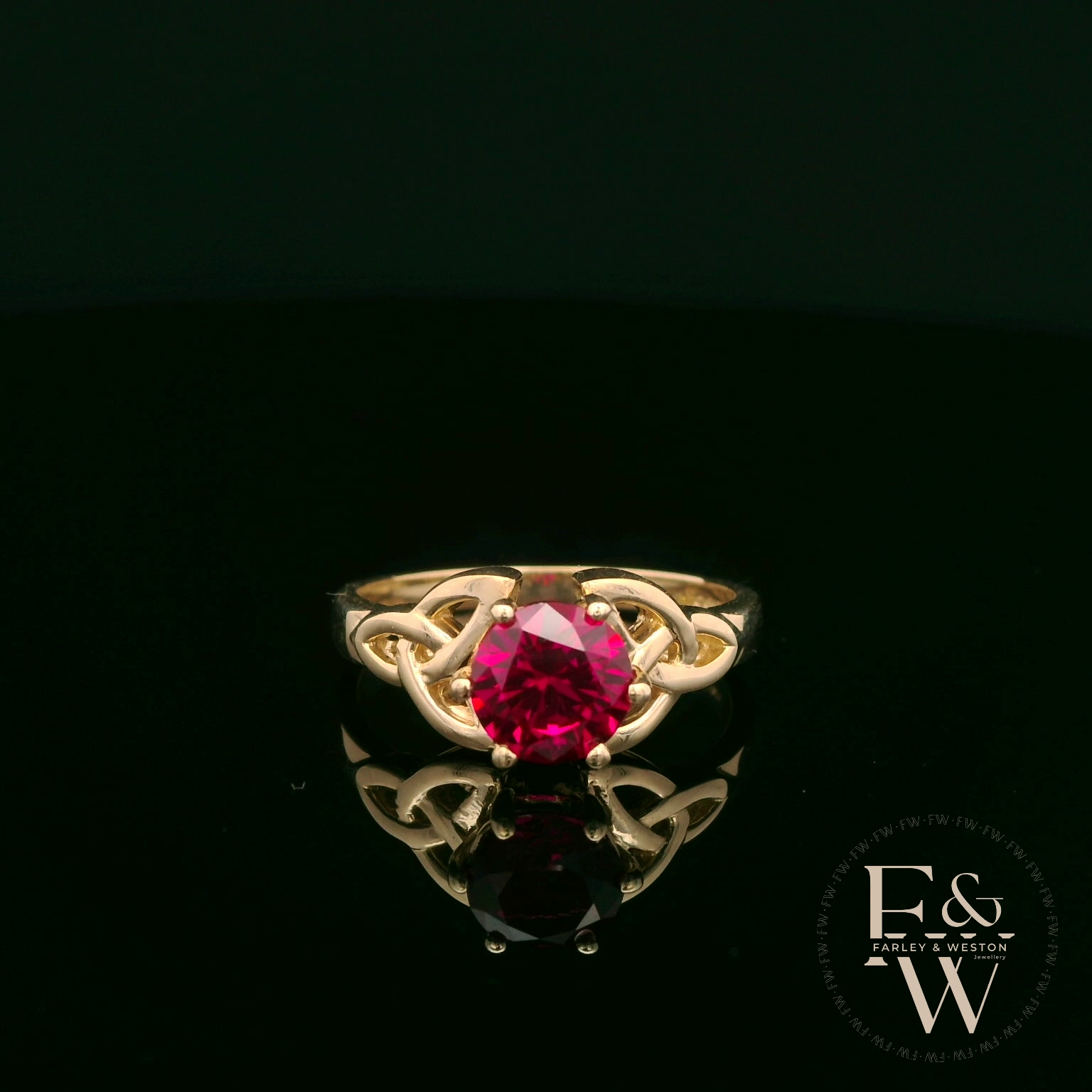 Celtic Patterned 9ct Yellow Gold Ruby CZ Single Stone Ring