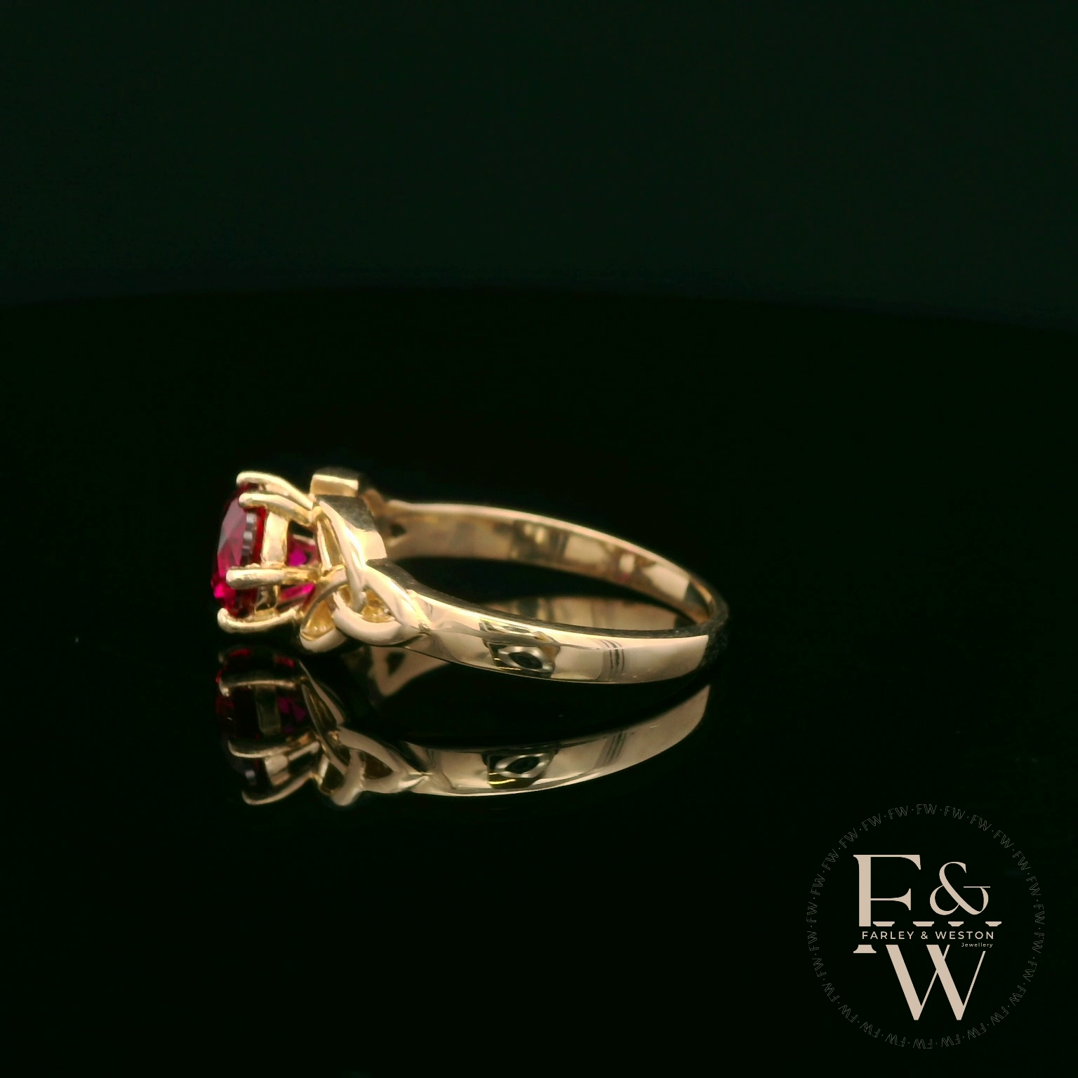 Celtic Patterned 9ct Yellow Gold Ruby CZ Single Stone Ring