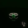 Solitaire Emerald & Silver Engagement Ring