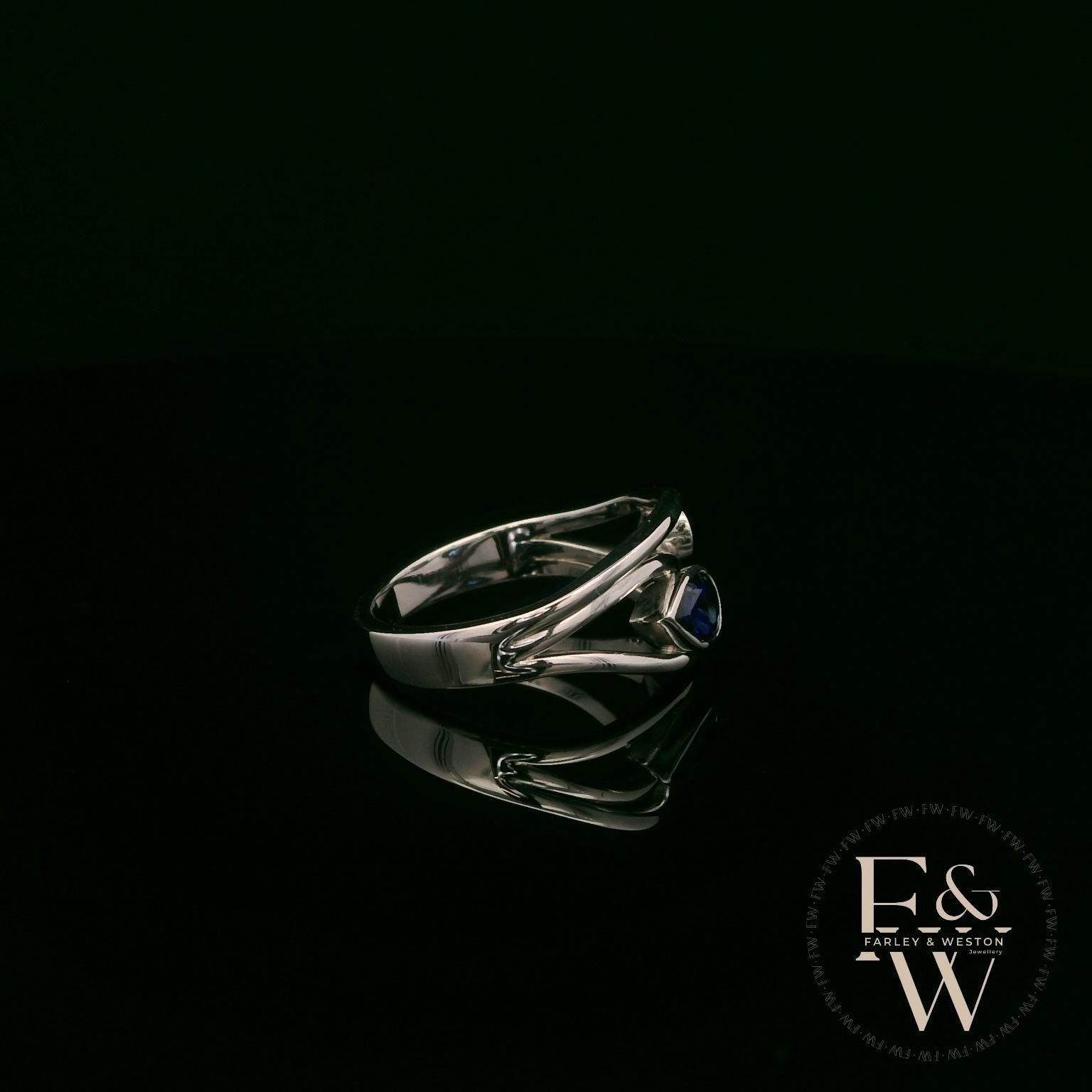 18ct White Gold Royal Blue Pear-Cut Sapphire & Diamond Ring