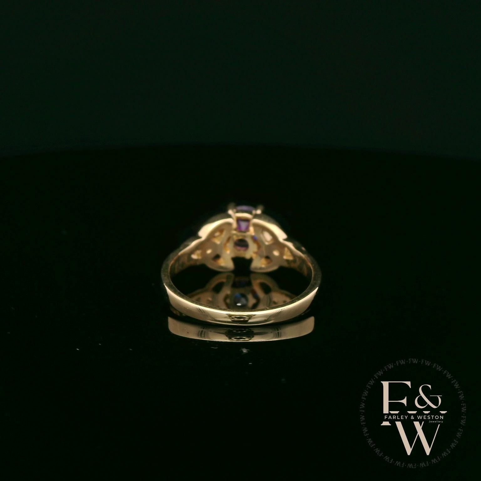 Keltischer Ring aus 9 Karat Gelbgold mit Amethyst und Zirkonia (einzelner Stein)