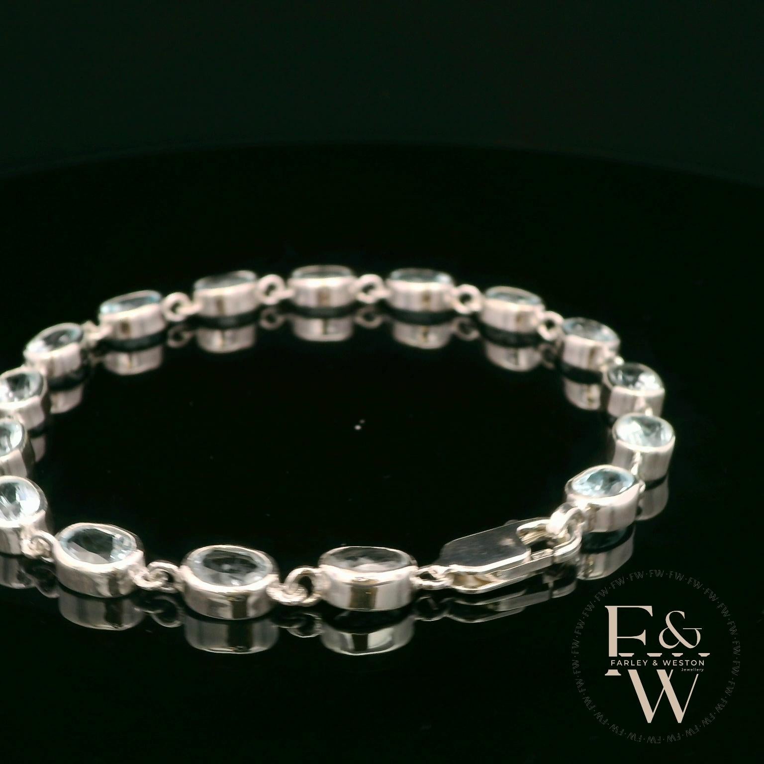 Sterling Silver Oval Blue Topaz Bracelet