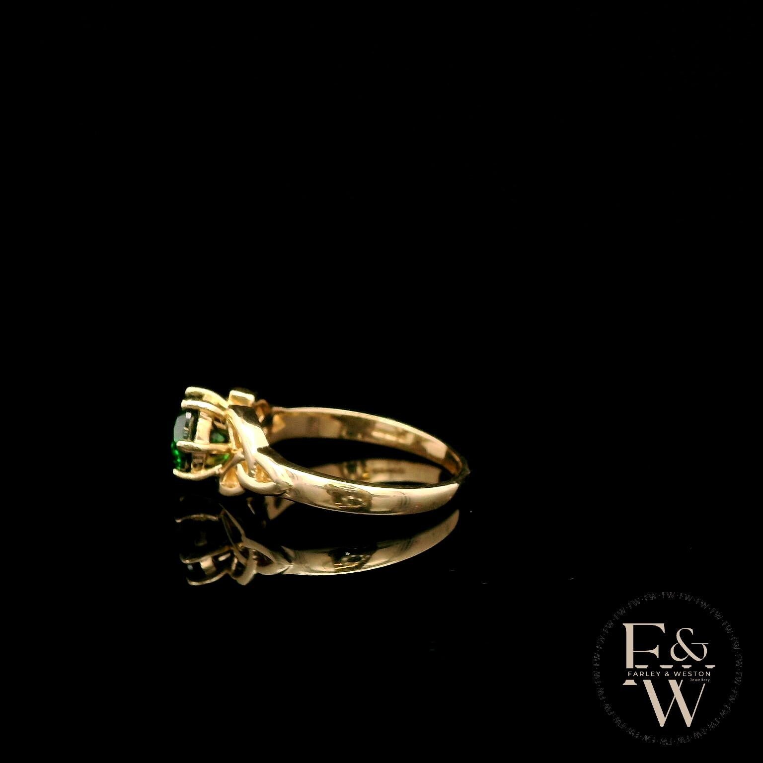 Celtic Patterned 9ct Yellow Gold Emerald CZ Single Stone Ring