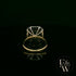 18ct White and Yellow Gold Emerald-Cut Emerald Diamond Halo Ring