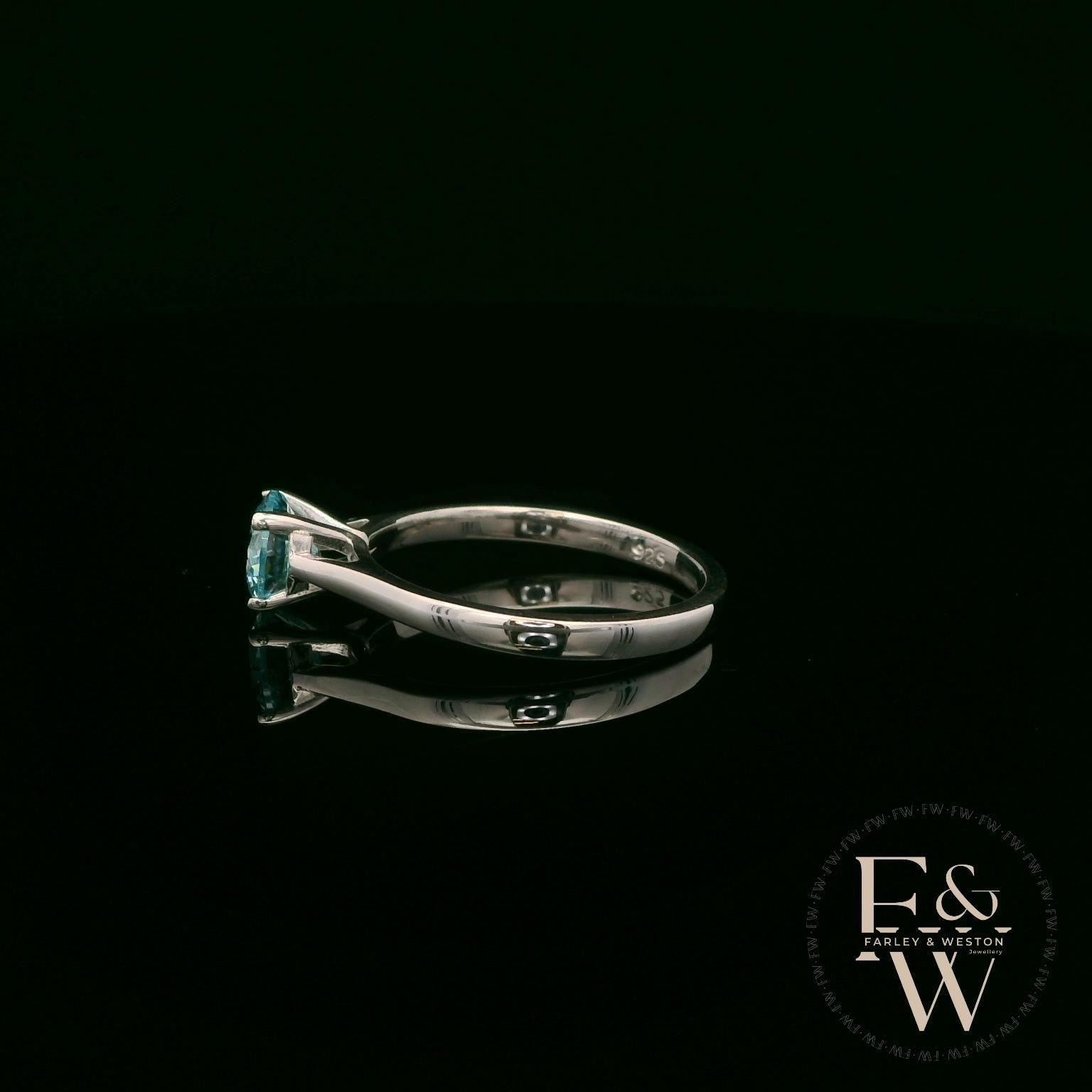 Solitaire Aquamarine & Silver Engagement Ring