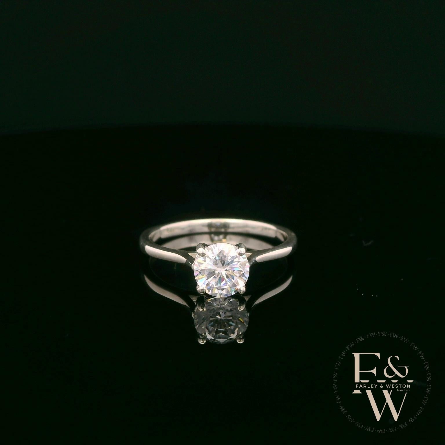 Sterling Silver Crossover Patterned White CZ Single Stone Ring