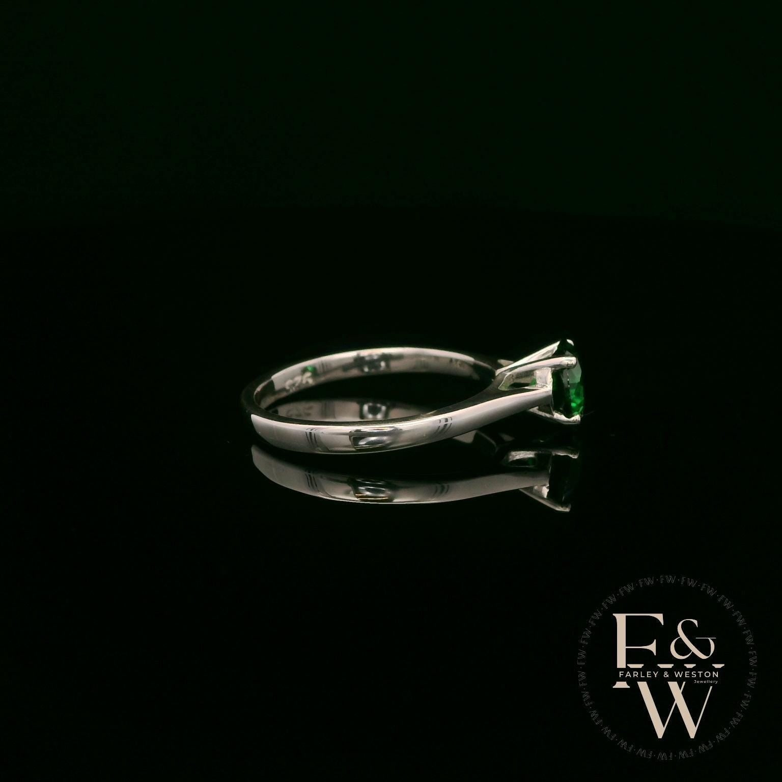 Solitaire Emerald & Silver Engagement Ring