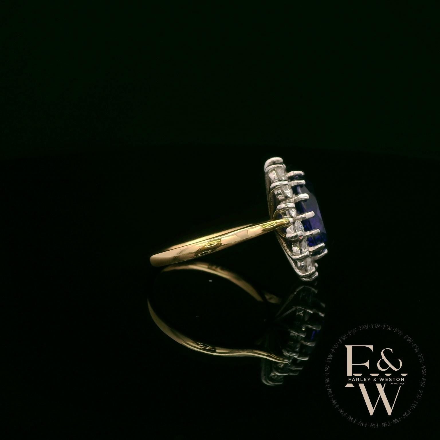 18ct White and Yellow Gold Oval-Cut Tanzanite & Diamond Halo Ring