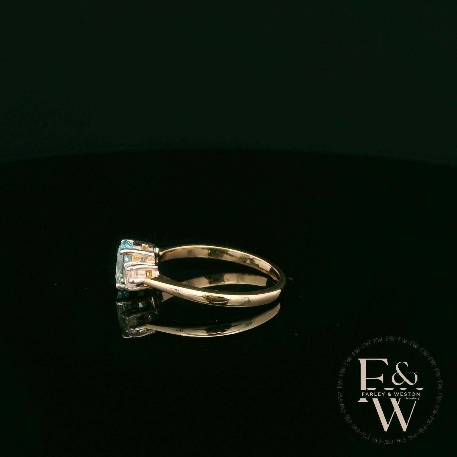 Lab Grown Aqua and Diamond 9ct Yellow Trilogy Ring