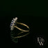 18ct White and Yellow Gold Oval-Cut Tanzanite & Diamond Halo Ring