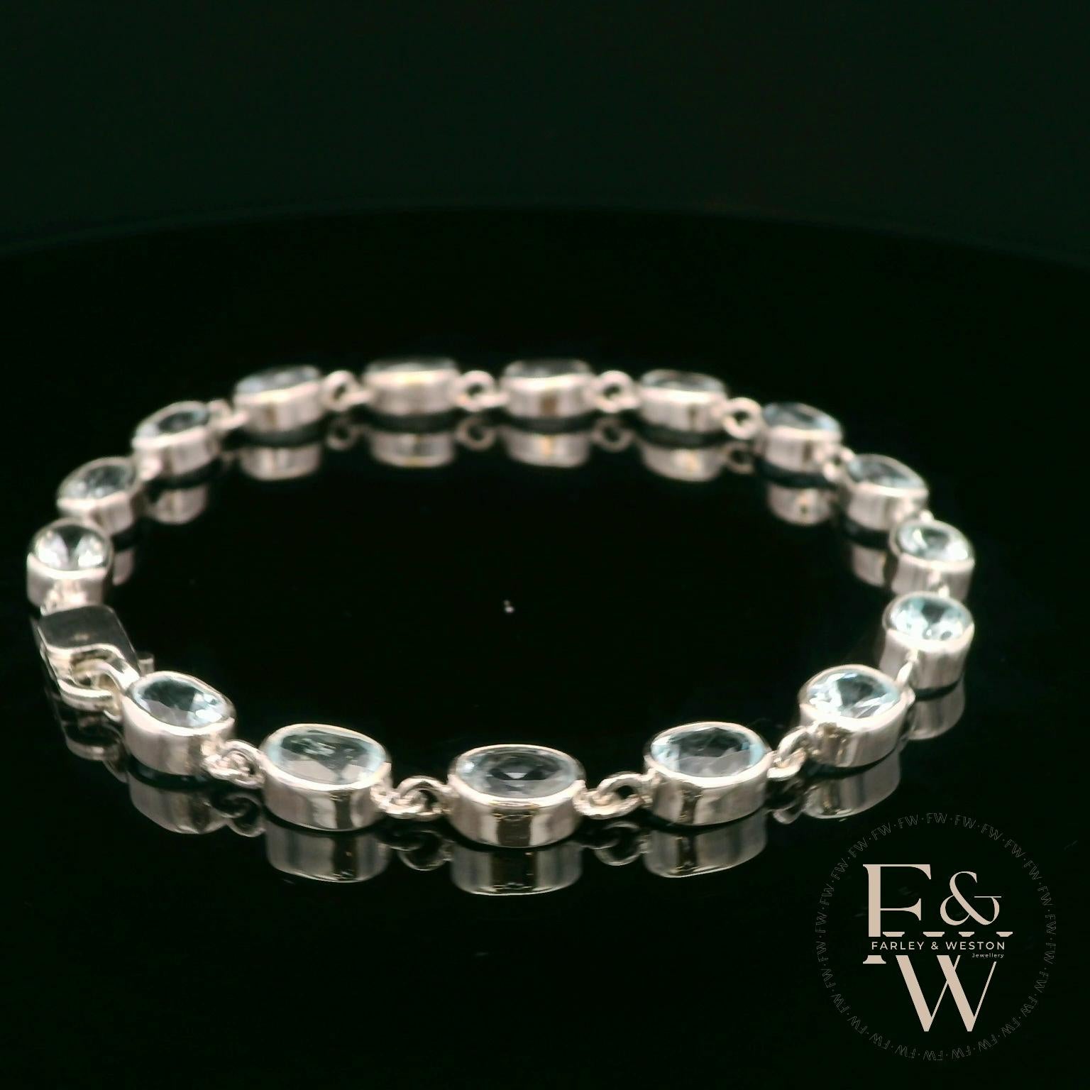 Sterling Silver Oval Blue Topaz Bracelet
