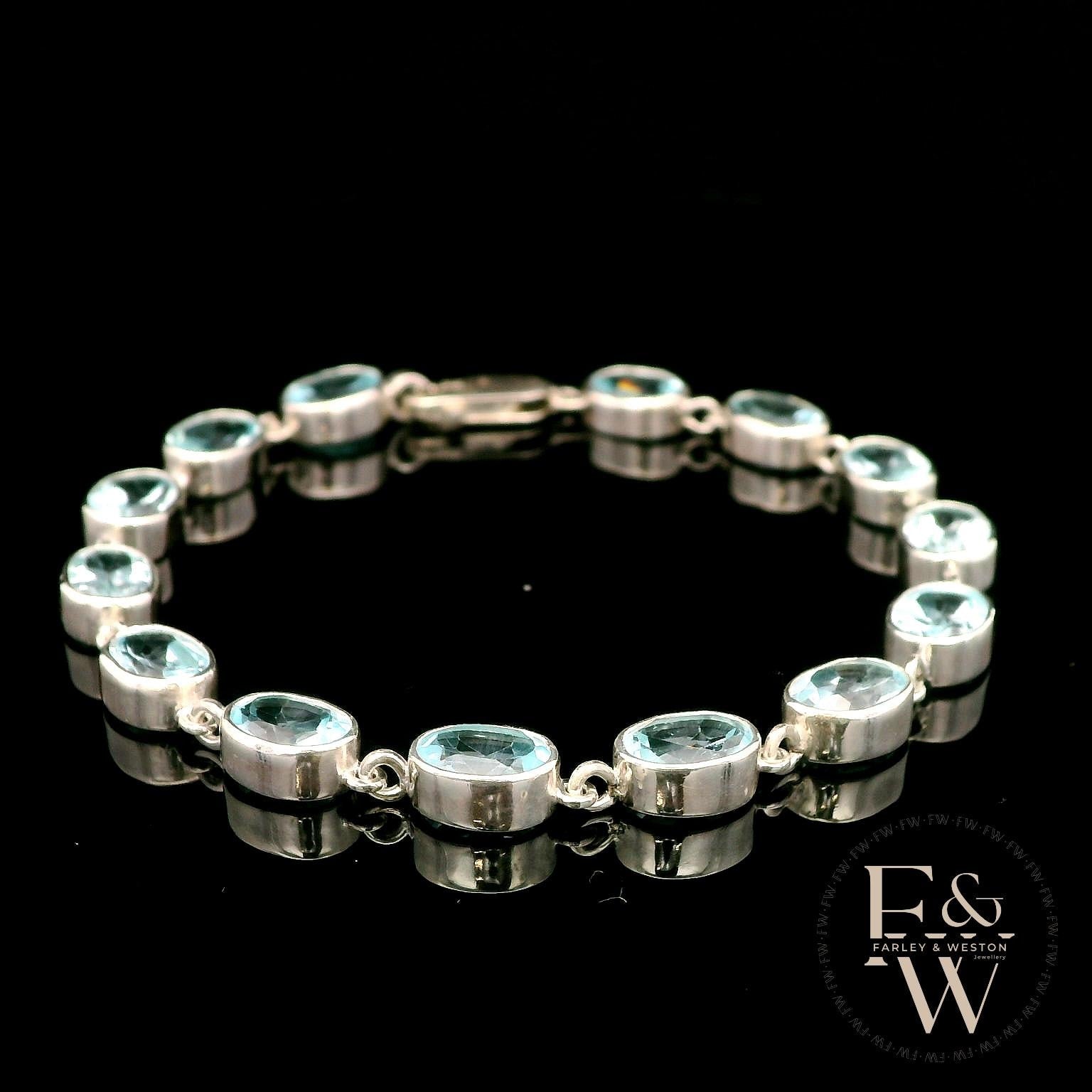 Sterling Silver Oval Blue Topaz Bracelet