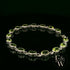 Sterling Silver Chain Bracelet with Cabochon Peridot Gemstones