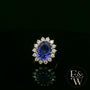 18ct White and Yellow Gold Oval-Cut Tanzanite & Diamond Halo Ring