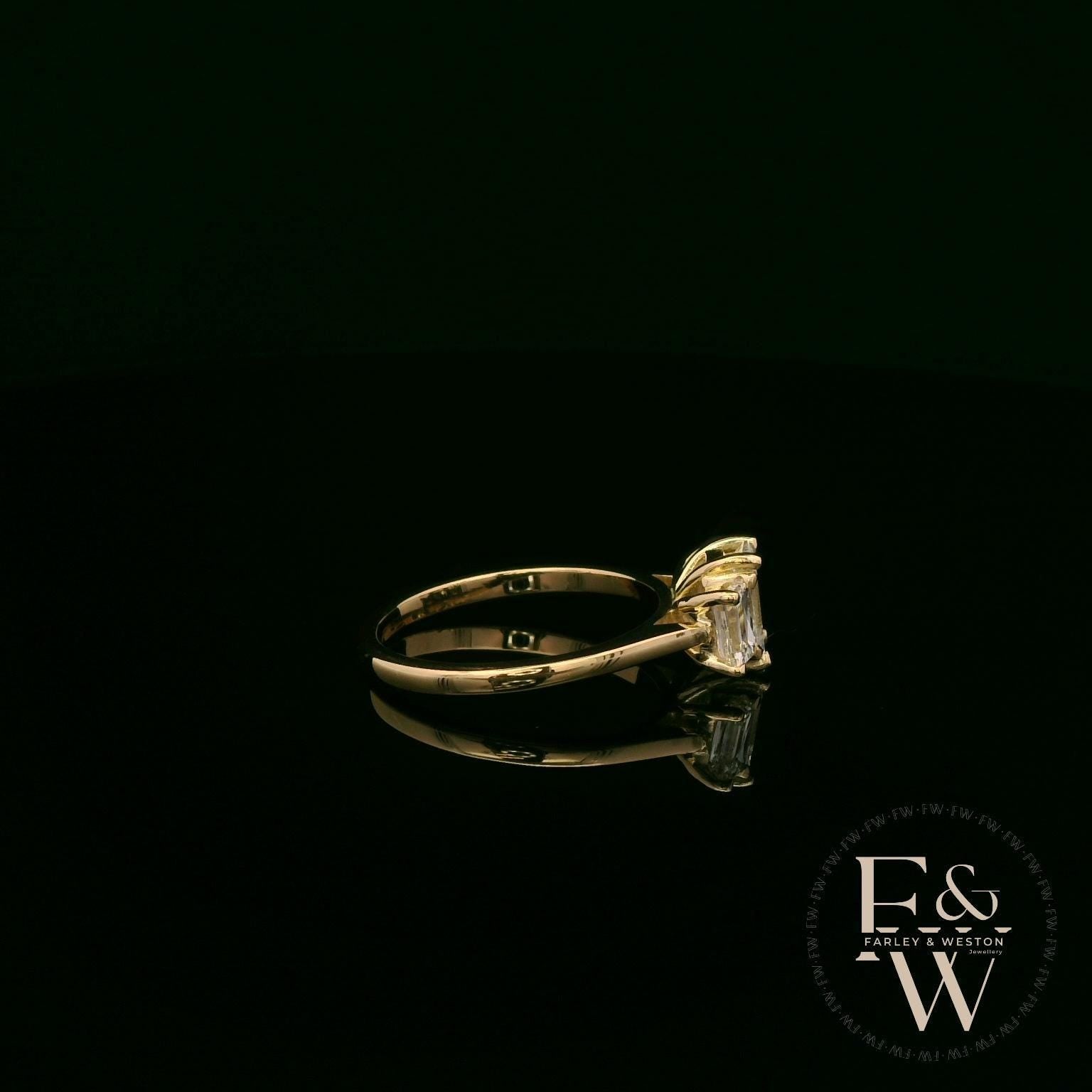 18ct Yellow Gold Three Stone Emerald-Cut Diamond Ring