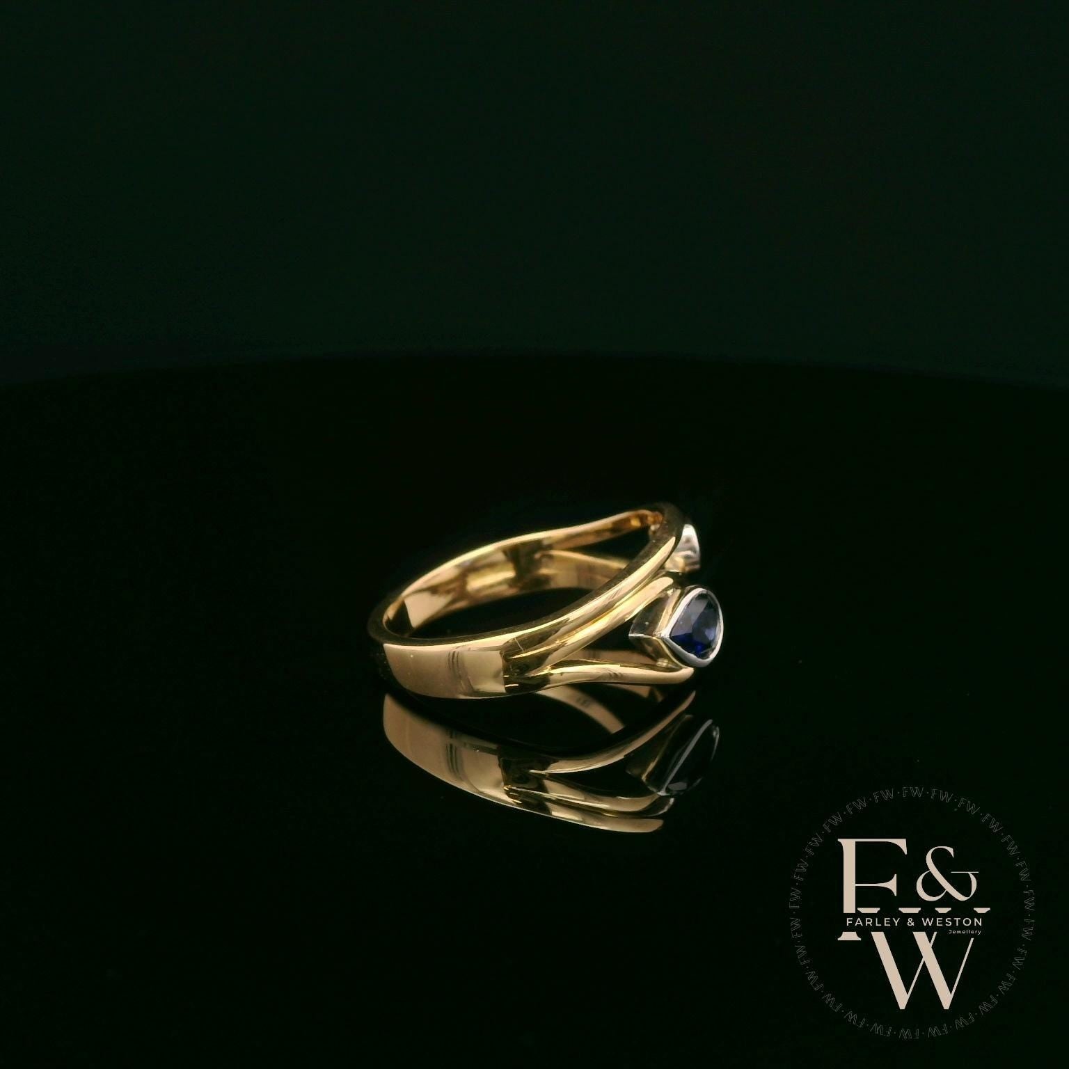 18ct White and Yellow Gold Royal Blue Pear-Cut Sapphire & Diamond Ring