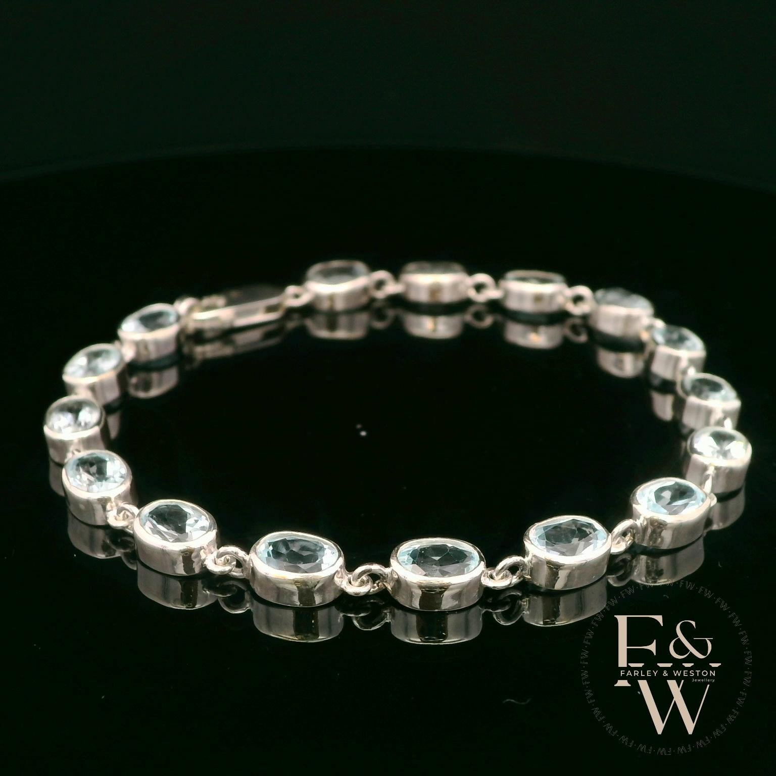 Sterling Silver Oval Blue Topaz Bracelet