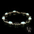 Sterling Silver Oval Cultured Opal and Garnet Bracelet