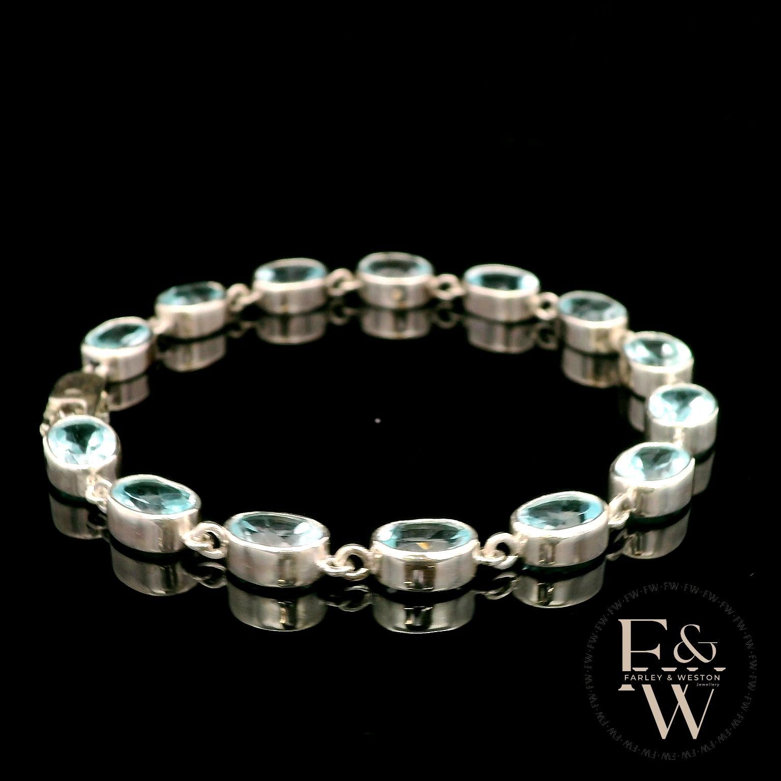 Sterling Silver Oval Blue Topaz Bracelet