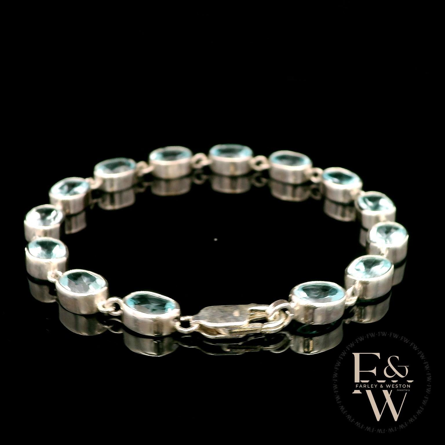Sterling Silver Oval Blue Topaz Bracelet