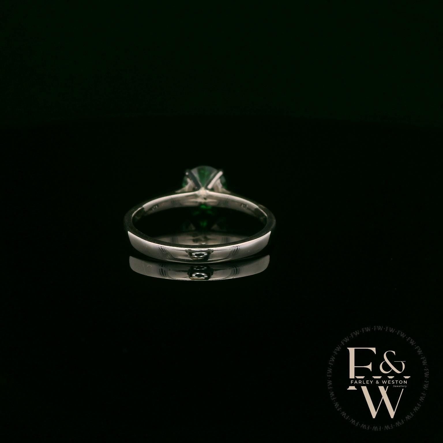 Solitaire Emerald & Silver Engagement Ring