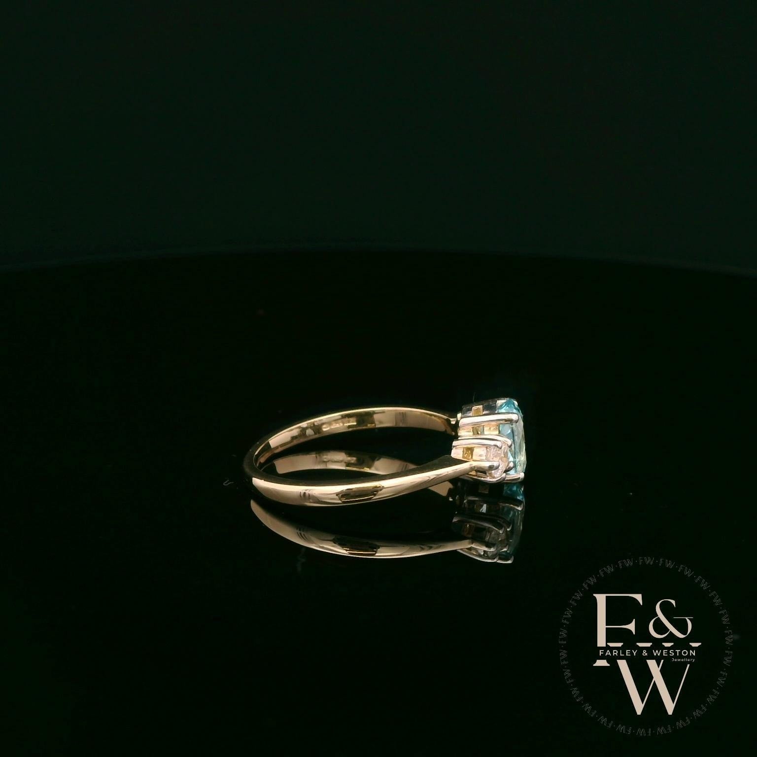 Lab Grown Aqua and Diamond 9ct Yellow Trilogy Ring