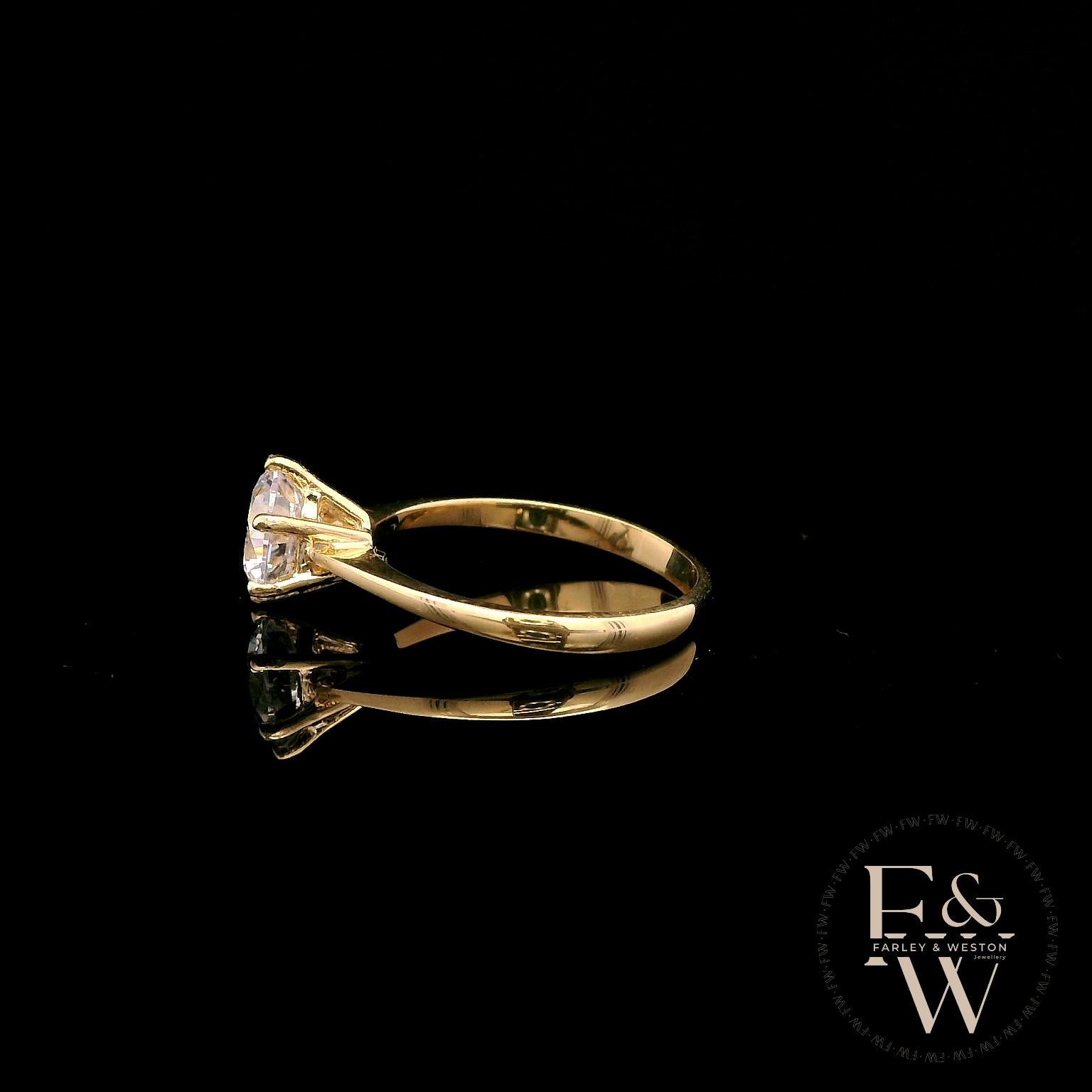 White Moissanite Solitaire 9ct Yellow Gold Ring