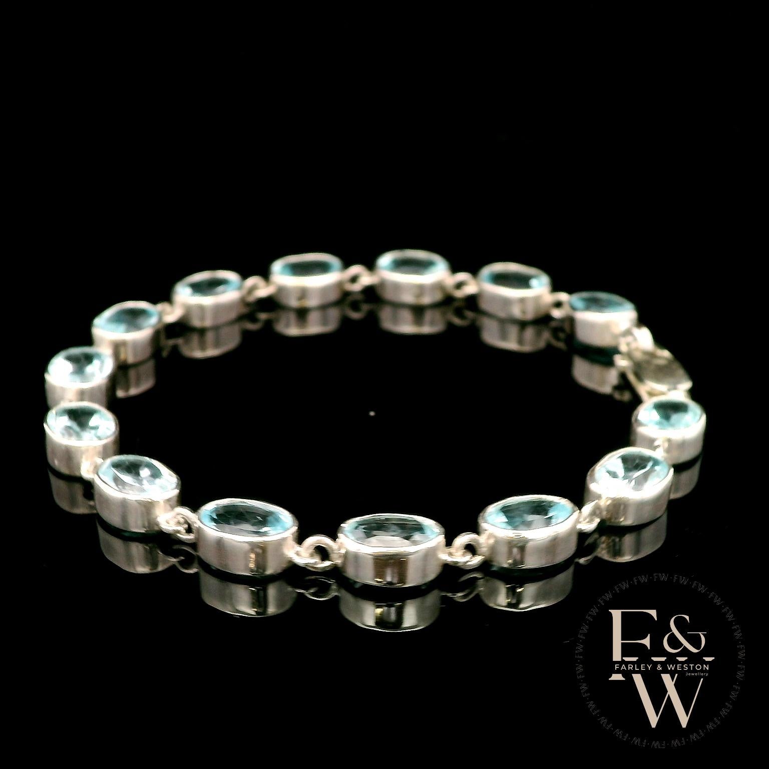 Sterling Silver Oval Blue Topaz Bracelet