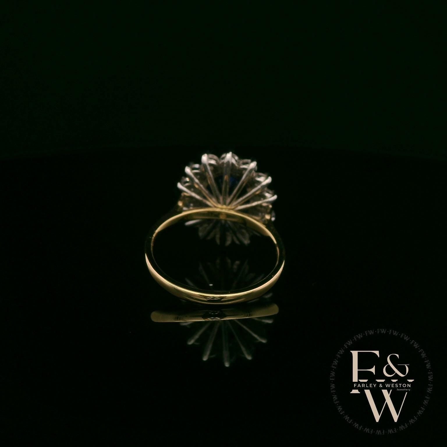 18ct White and Yellow Gold Oval-Cut Tanzanite & Diamond Halo Ring