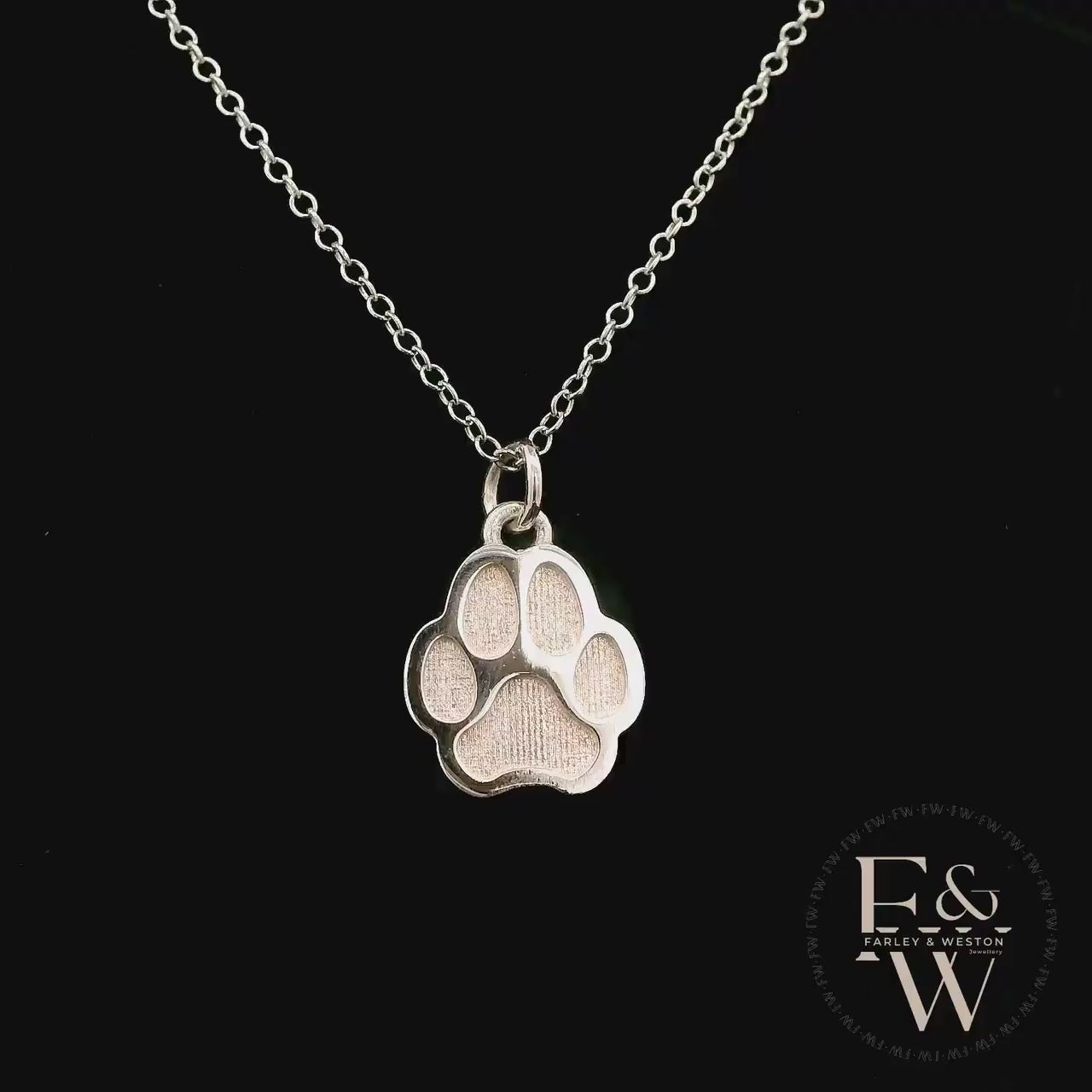 Charming Silver Paw-Print Pendant